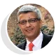Portrait of Deepak Verma, client of QA Solve, featured in testimonial highlighting QA and software testing services
