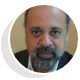 Portrait of Joy Dasgupta, QA Solve client, featured in testimonial highlighting software testing services